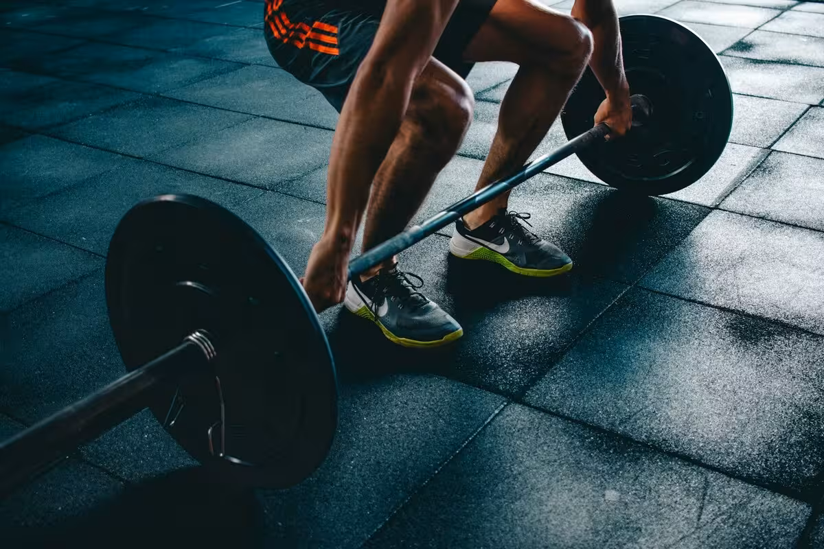 Arms lifting weights in a training set